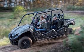 Quad, a tandem bicycle with four seats. Quad Safari Fahrgeschafte Im Serengeti Park