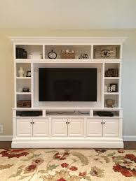 Downright Simple This Is My Diy Built In Wall Unit Made For 60 Tv I Used Three In Stock Brown Maple Built In Wall Units Built In Tv Wall