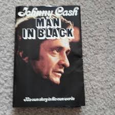 Vintage Johnny cash man in black autographed book