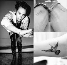 His final tattoo was a matching symbol with rapper riff raff of a chinese takeaway box. Luke Hemmings Tattoo Twitter