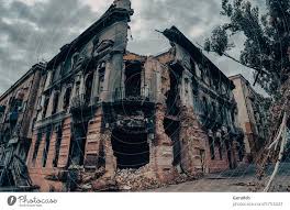 destroyed and burned houses in the city ...