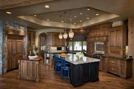 A rustic pendant light can be a game changer for your kitchen island. Spanish Peaks Retreat Rustic Kitchen Other By Locati Architects Houzz