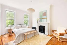 You don't need to much to be cool! fur, blankets, wall art, bricked walls, a bed made of pallets and a wooden flooring make this bedroom the typical nordic/scandinavian styled room. 9 Scandinavian Style Homes Exterior And Interior Examples Ideas Photos Home Stratosphere