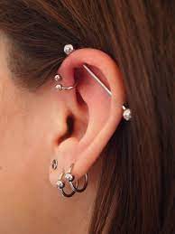 70 Ideas For An Ultra Feminine And Modern Look Ear Piercing Trendsforladies Piercing Oreille Industriel Piercing Oreilles Piercing Au Oreille