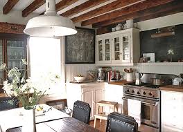 As factories have closed over the past decades tables and other items of equipment have been disgarded we now see value in such pieces. Rmikd43 Rustic Modern Industrial Kitchen Design Wtsenates