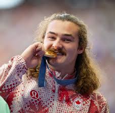 Smile if you're the first Canadian man to win a gold medal in hammer throw  at the Olympics! 😃 Ethan Katzberg, the youngest ever hammer throwing  Olympic champion. 🥇 📸: Mark Blinch /