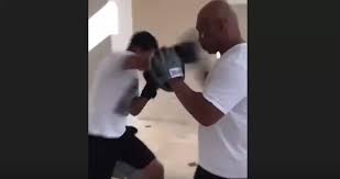 Mike Tyson's Son Is Just As Savage As His Dad After Showing Off His Skills  On The Pads