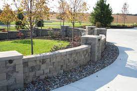 Courtyard entrances are often surrounded on three sides by a short wall, with the front of a house making up the fourth wall. Front Yard Landscapes Upgrade Your Picket Fence