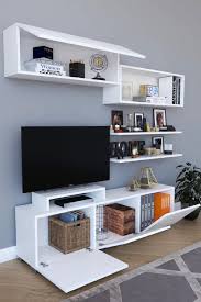 Tv ünitesi nasıl dekore edilir diyenler için kitap, çerçeve ve küçük bibloların öneminden bahsetmeliyiz. Kzy Mobilya Dekor Tv Unitesi Beyaz Fiyati Yorumlari Trendyol