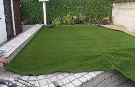 If you put seed , put it down ,put some seed cover and water it for 3 times a day for about five minutes each time.then water once after the seed comes out. How To Lay Artificial Grass On Concrete My Gardening Network