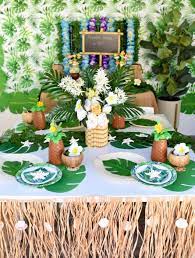 Put a tropical twist on the traditional game of ring toss by swapping out the rings for faux flower leis. Boy S Tropical Luau First Birthday Party Fun365