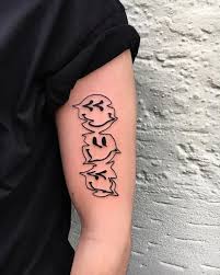 We Re All Happy Down Here Warped Smiley Face Tattoos On The Arm Www Otziapp Com Sharpie Tattoos Tattoos Tattoos For Guys