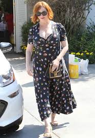 Christina Hendricks has 'Judy Finnigan moment' as bra bursts out dress -  Daily Star
