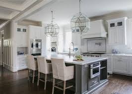 This kitchen is a bit smaller, some would categorize it as a galley space. White And Gray Kitchen Designed By Jackbilt Homes Home Bunch An Interior Design Luxury Homes Blog Grey Kitchen Designs Grey Kitchen Kitchen Design