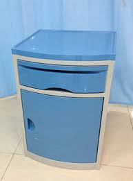 High quality steel is used in the production of the base of the bedside table while the table top is laminated. Abs Plastic Movable Hospital Bedside Table Medical Drawers Cabinet With Four Castors