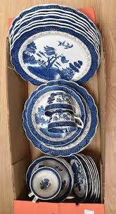 Chinese green glaze small saucer dish with moulded key pattern, qing dynasty. A Booths Real Old Willow A8025 Part Dinner Set Comprising Five Cups Six Saucers Six Small Bowls Six Dessert Plates Seven Dinner Plates Six Further Dinner Plates Dish Plus Eleven Masons Dishes