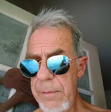 Looking at buying this piece but it looks off to me, and cant seem to find  the mint mark does anyone recognize it or think its genuine ?