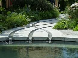 Beautiful Criss Crossing Rills Sculpted In Granite Slabs Run Down To The Shadow Pool Tom Hobly Water Features In The Garden Landscape Design Water Features
