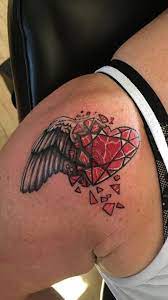 Rose with wings tattoo meaning. 150 Divine Angel Wings Tattoos Ideas Meanings Tattoo Me Now