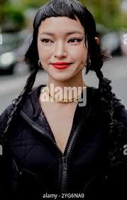 Street style, Chau Bui arriving at Louis Vuitton Spring Summer 2023 show,  held at Musee du Louvre, Paris, France,