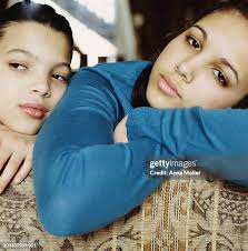 Mother And Daughter Smiling Closeup Portrait High-Res Stock Photo