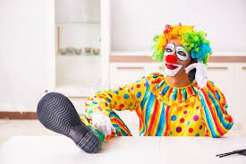 The Male Clown Preparing For Perfomance At Home Stock Photo Image Of Harlequin Corporate 147703390