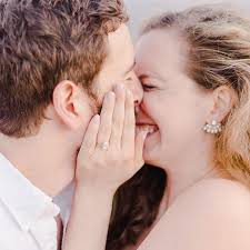 This Girl's Reaction To Her Boyfriend Proposing With 16 Dogs Is Priceless