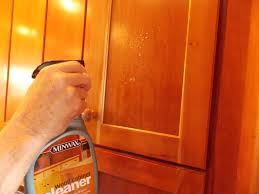 One of the best ways to clean greasy kitchen cabinets made of wood is with baking soda and vegetable oil. Cleaning Your Kitchen Cabinets Minwax Blog