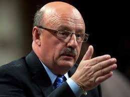 Harper defends surprise EI house calls amid 'abuse' claims