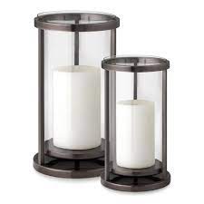 Provide an intimate setting with votive or tea light holders. Metal Frame Hurricane Candle Holder Williams Sonoma