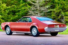 Image result for Riviera Red 1966 GM