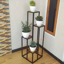 Berbagai inovasi, kreasi dan ide perlu anda cari untuk mendapat hasil rak bunga yang cantik, sehingga anda bersama. Jual Rak Pot Tanaman Hiasan Rumah Alas Kayu Rak Bunga Besi Hollo 4 Susun Kab Kuningan Duakaki Shop Tokopedia