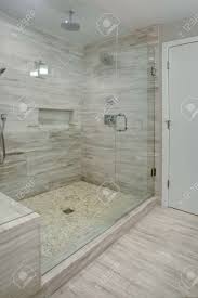 Wondering what a shower niche could do for you? Perfectly Designed Seamless Glass Shower With Grey Marble Tiles Stock Photo Picture And Royalty Free Image Image 97392479
