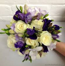 Purple And Cream Wedding Flowers Brides Bouquet With Lilac Freesia Purple Lissianthus And Ivory Ros Wedding Bridal Bouquets Wedding Flowers Wedding Bouquets