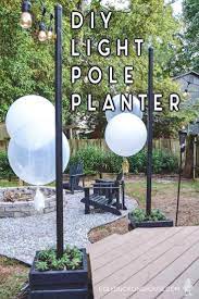 Diy Outdoor Light Pole Planters Around The Deck Free Plans Hanging Patio Lights Diy Outdoor Lighting Outdoor Hanging Lights