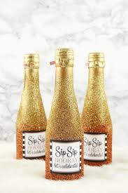 Gifting the couple favorite vintage of wine or a fine bottle of champagne? Glitter Mini Champagne Bottles For Party Or Wedding Mod Podge Rocks