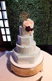Houston S Best Cakes Cakes By Gina Gold Wedding Cake Hexagon Wedding Cake Wedding Cakes With Flowers