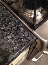 Pin By Michelle Belton On Remodeled Home Blue Pearl Granite Granite Kitchen Antique White Cabinets