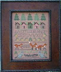 For 15 years they have been designing cross stitch patterns and offering them for realistic prices so everyone has the ability to enjoy this wonderful craft. Designs By Lisa Woodland Sampler Cross Stitch Pattern