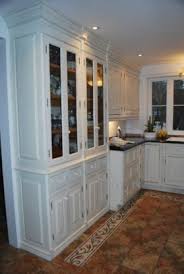 Recessed panel drawer fronts and a luxurious glaze finish make this traditional kitchen a timeless classic. Kitchen Cabinets In Hudson Qc Yellowpages Ca