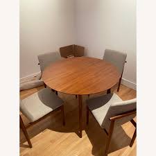 Mid century modern expandable dining table: West Elm Mid Century Round Expandable Dining Table Aptdeco