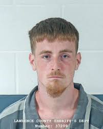 Felon found with firearm and drugs is arrested in Bedford