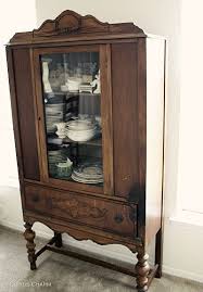 A chinese ming dynasty style red rose butterfly console cabinet from the 19th century, with everted flanges, double doors and carved panels. Cupids Charm Notes From A Charmed Life July 2010 Vintage China Cabinets Antique China Cabinets Vintage China