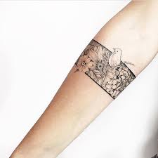 Floral Bracelet Tattoo With A Bird Black Bracelet Tattoo Filled With Flowers And A Small Bird Ink Tattoo Neck Tattoo Arm Band Tattoo