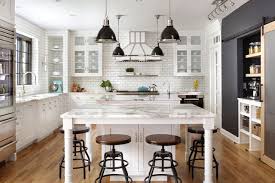 This geometric floor design personalizes the long, narrow galley kitchen. Kitchen Of The Week French Industrial Style In Black And White