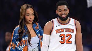 Jordyn Woods supports Karl-Anthony Towns in custom jacket during Knicks-Cavs Game 1