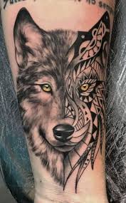 These tattoo designs can be as varied and interesting as your imagination the wolf and the raven are prominent fixtures in native american lore. 20 Tribal Wolf Tattoos Meanings Tattoo Designs More