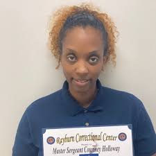 MSgt. Courtney Holloway has been selected as Rayburn Correctional Center's  Correctional Officer of the Month for August 2024. Warden Travis Day and  Deputy Warden Keith Bickham presented MSgt. Holloway the award. Having