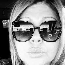 What massages or treatments can help reduce belly inches after pregnancy?