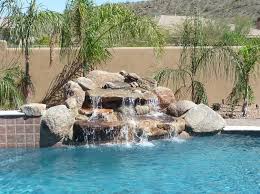 Pool fountains come in many different varieties and models on the market so that there is something to choose for people with different pools and styles. Rock Waterfall Pool Ideas True Blue Pools